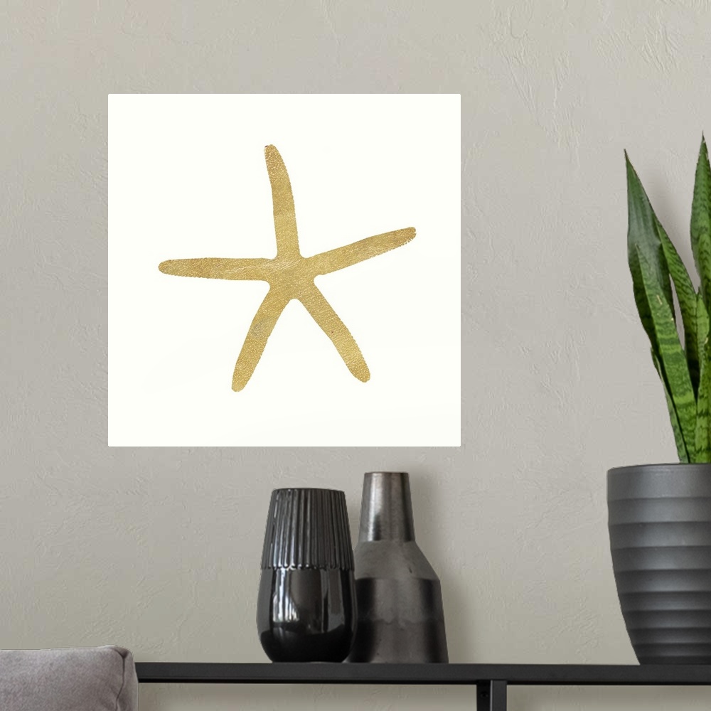 A modern room featuring Minimalist artwork of a golden starfish outline on off-white.