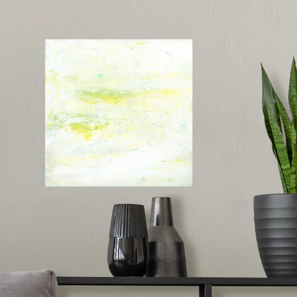 A modern room featuring Contemporary abstract painting using pale lime green tones.