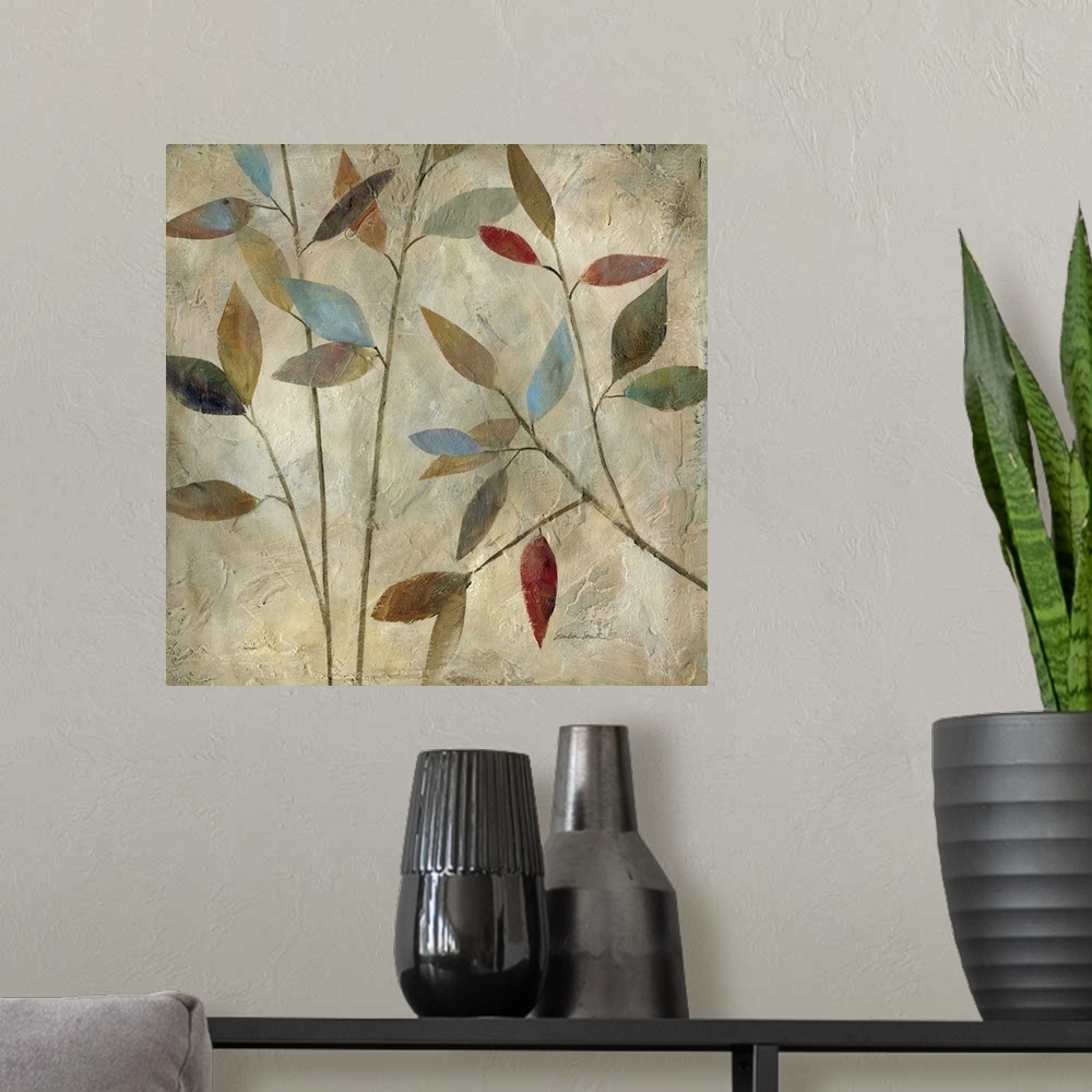 A modern room featuring Painting of thin branches with different colored leaves in muted colors.