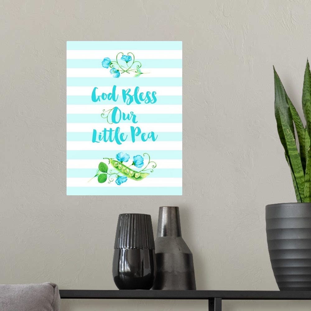 A modern room featuring "God Bless Our Little Pea" in blue, white, and green