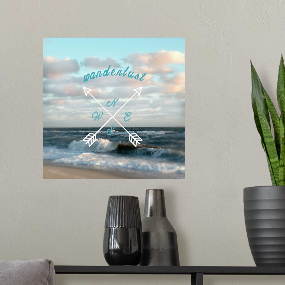 A modern room featuring Beach house decor of arrows and typography design against a beach scene.