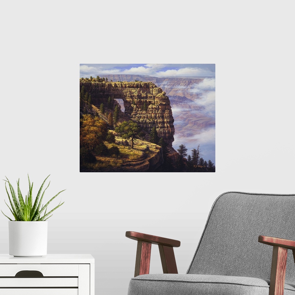 A modern room featuring Clouds trapped in mountains near a natural arch.