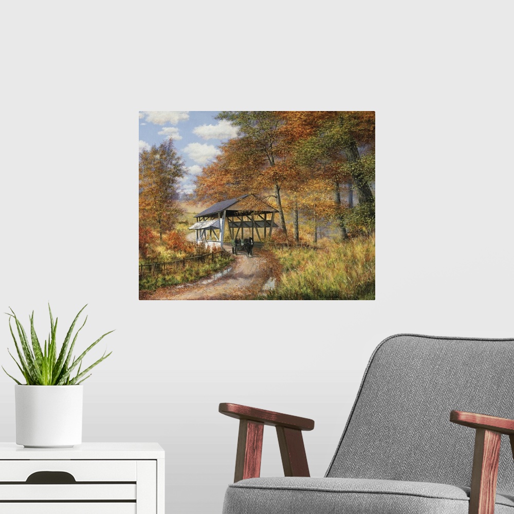 A modern room featuring Covered bridge on dirt road through autumn woods.