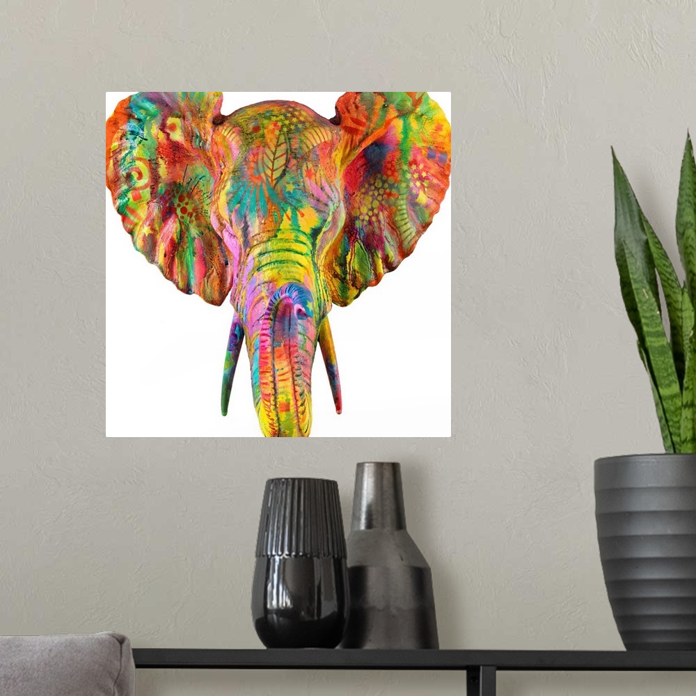 A modern room featuring Colorful painting of an elephant's head and tusk covered in abstract designs on a sold white back...