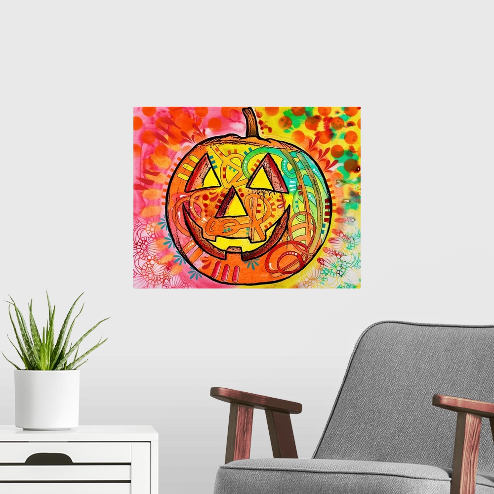 A modern room featuring Brightly colored painting of a jack o lantern surrounded by abstract designs.