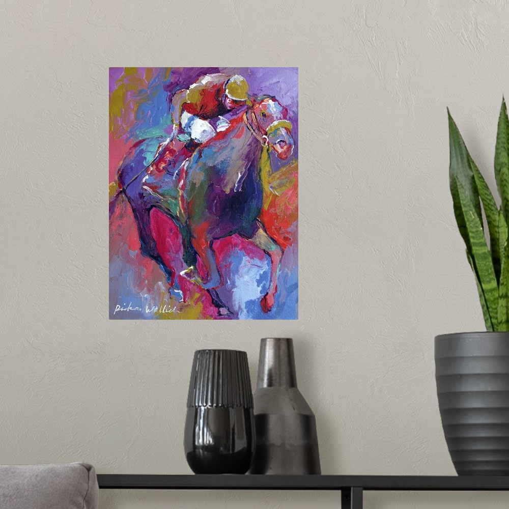A modern room featuring Contemporary colorful painting of jockeys riding horses in a race.
