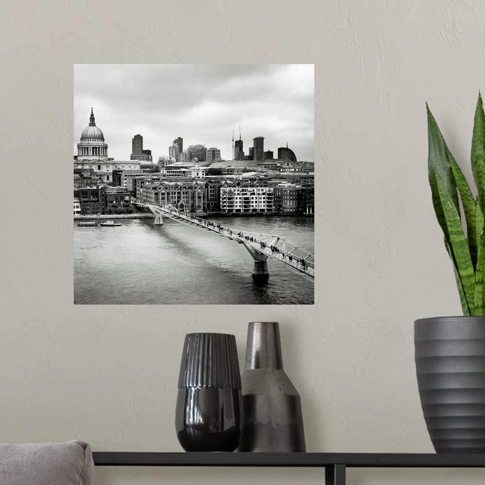 A modern room featuring London Millenium Bridge, black and white photography