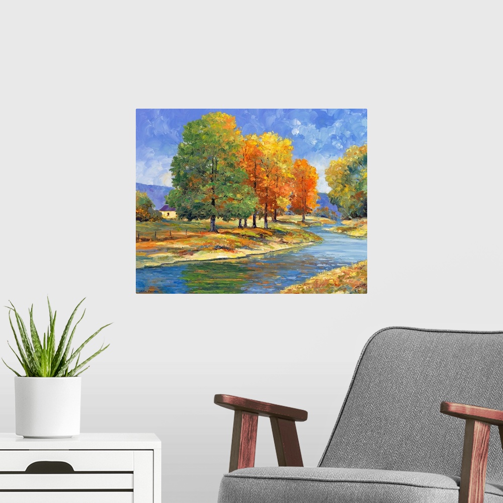 A modern room featuring trees with changing color leaves along a riverautumn