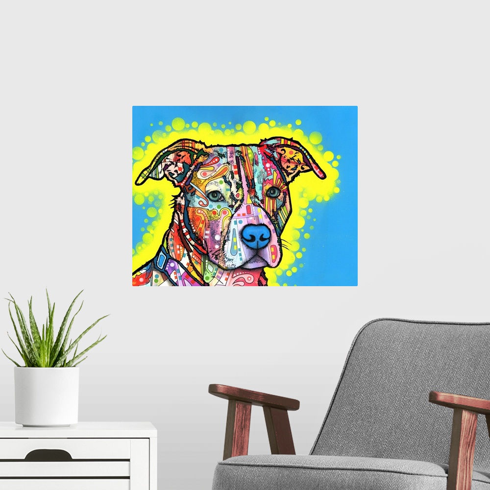 A modern room featuring Playful painting of a colorful pit bull with graffiti-like designs on a blue background with a ye...