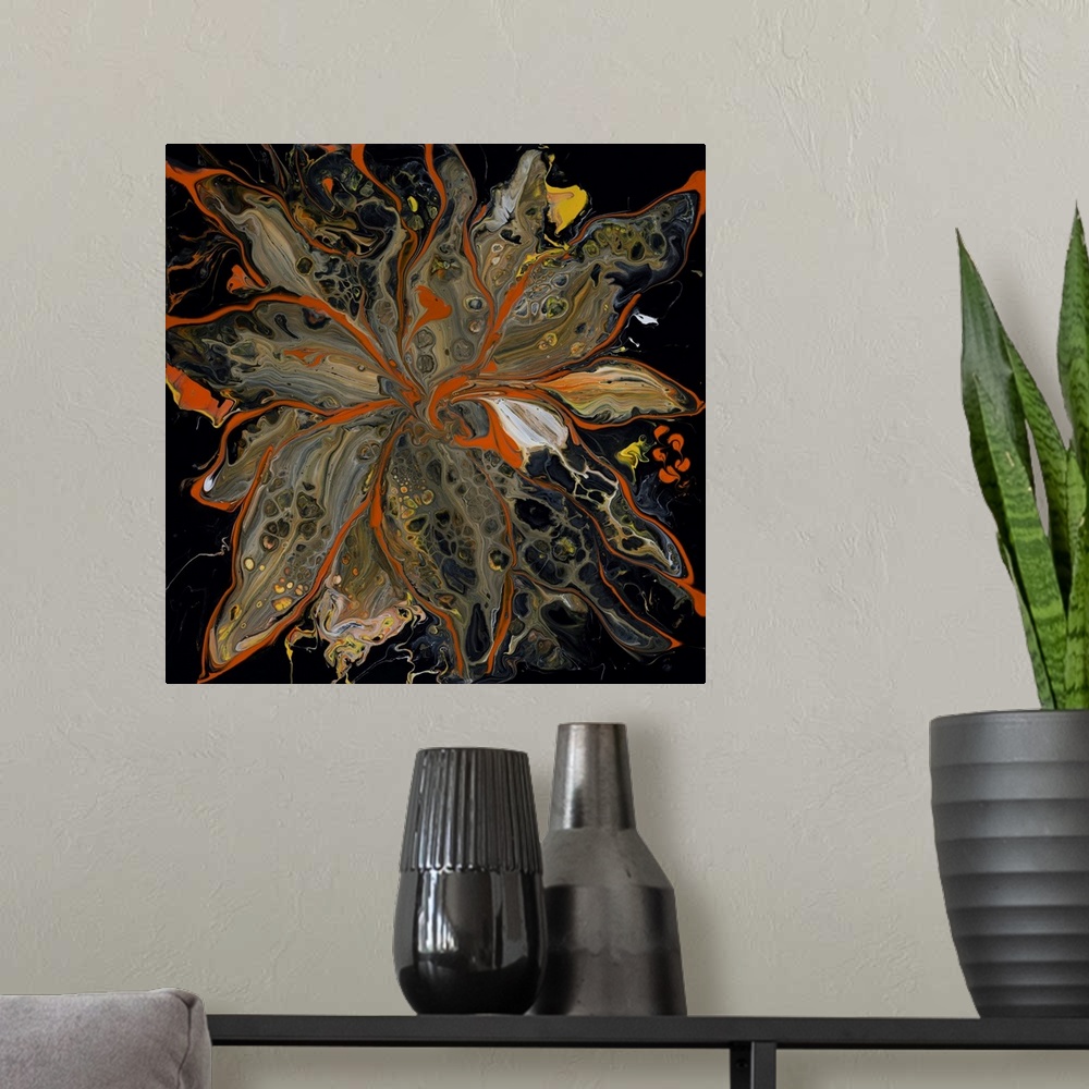 A modern room featuring Pour painting of a flower outlined with bright orange that complements its neutral-colored petals...