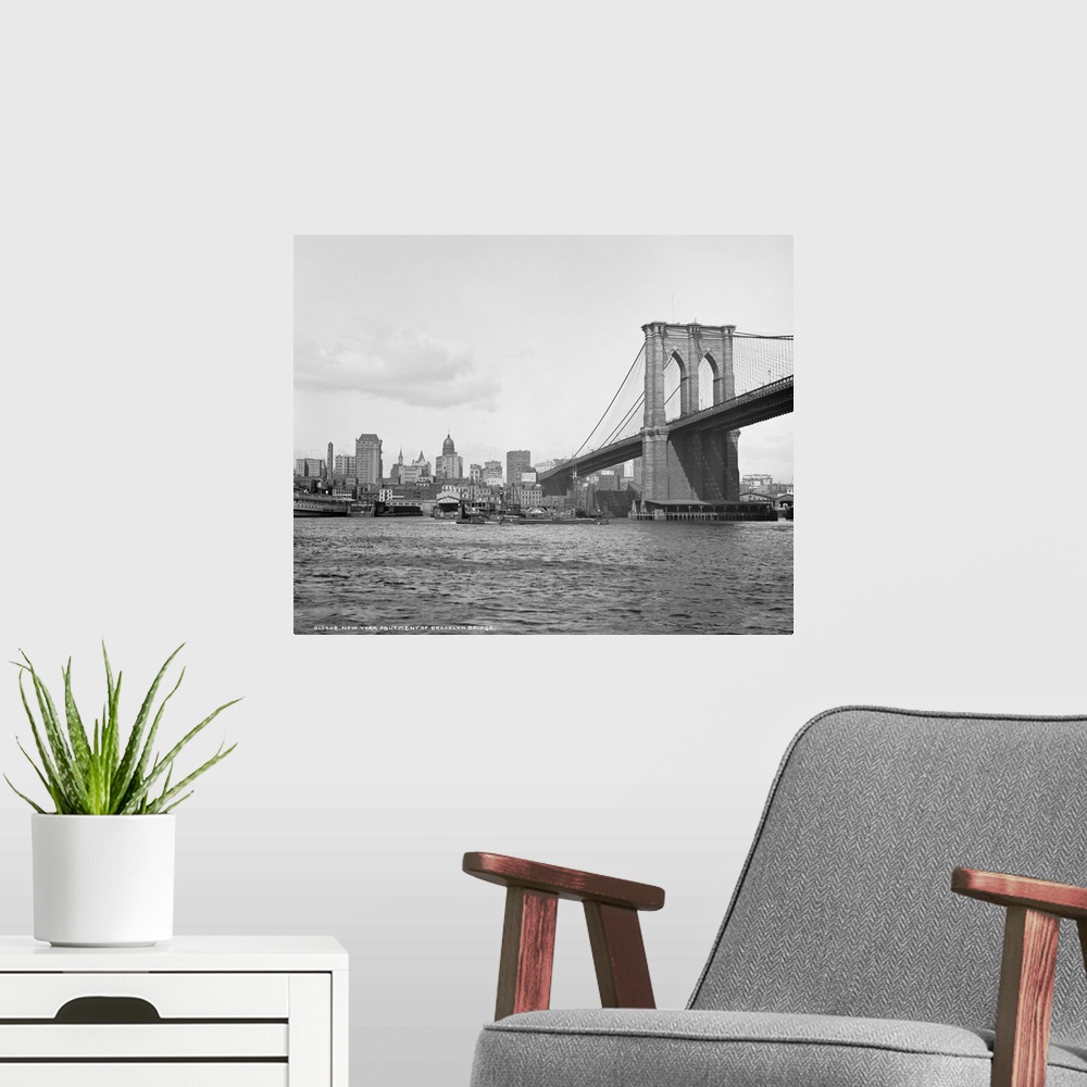 A modern room featuring Vintage photograph of Brooklyn Bridge and East River, New York City