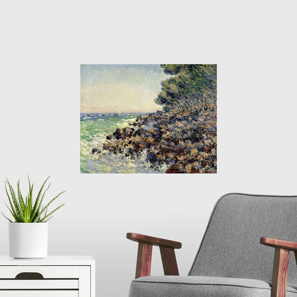 A modern room featuring Impressionist oil painting by Claude Monet of a rocky beach shore overlooking the ocean.