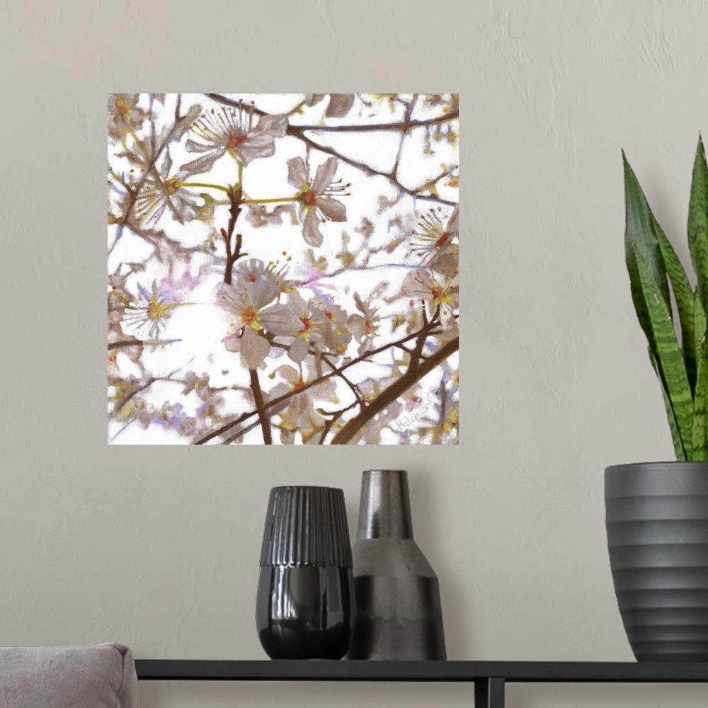 A modern room featuring Contemporary painting of white flowers on the branches of a tree.