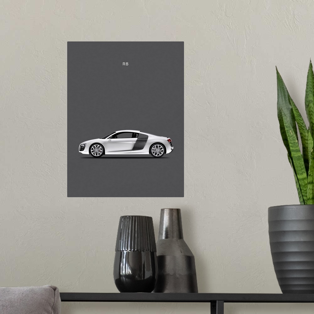 A modern room featuring Photograph of a silver Audi R8 printed on a dark gray background