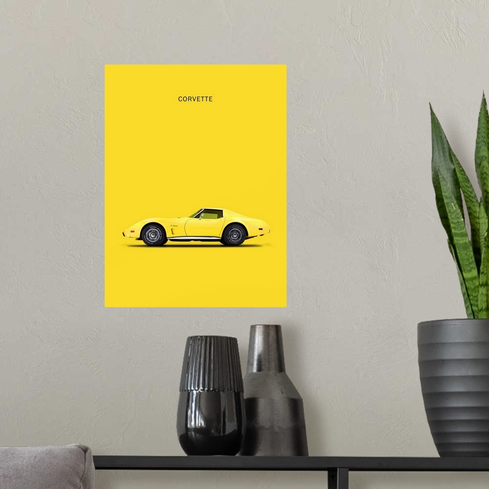 A modern room featuring Photograph of a yellow Chev Corvette printed on a yellow background