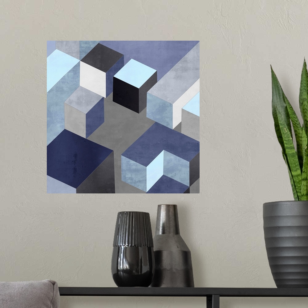 A modern room featuring Abstract square art created with black, white, silver, and blue squares creating 3D looking cubes...