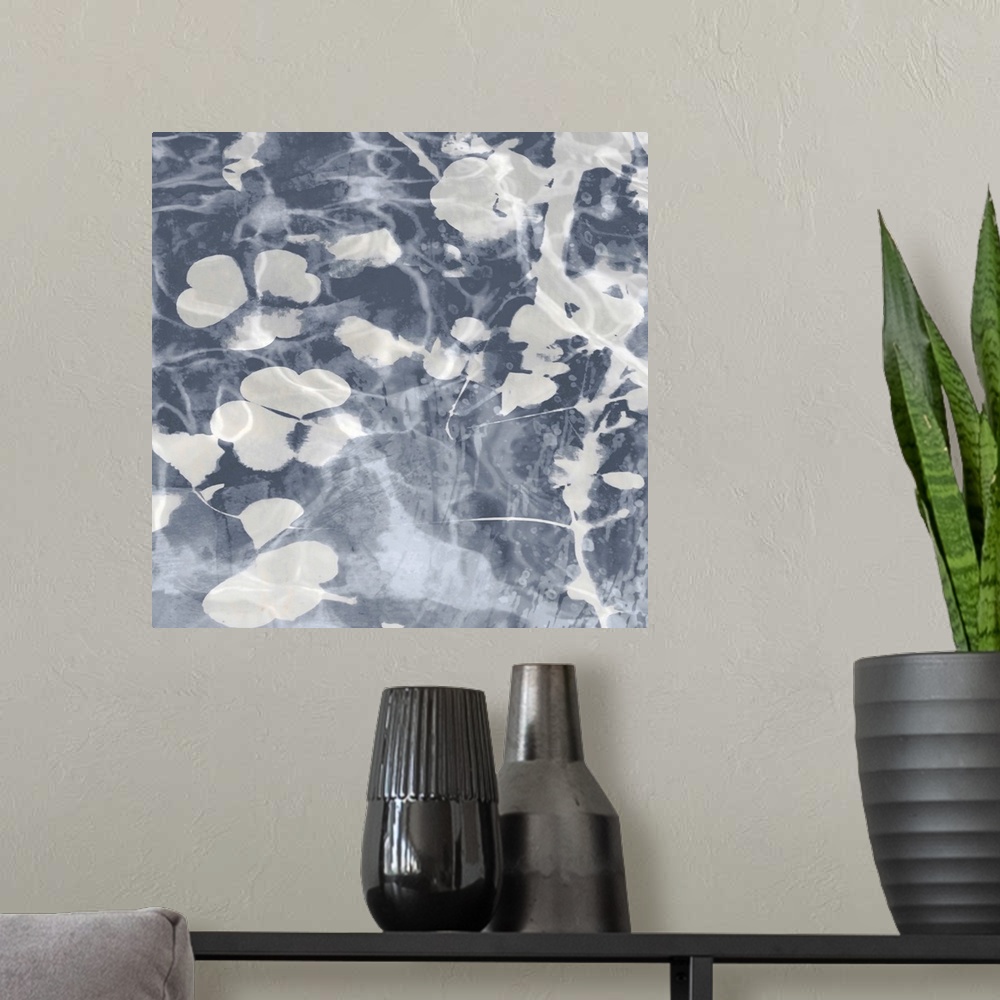 A modern room featuring Contemporary artwork featuring soft white petals over a mottled background in shades of gray.