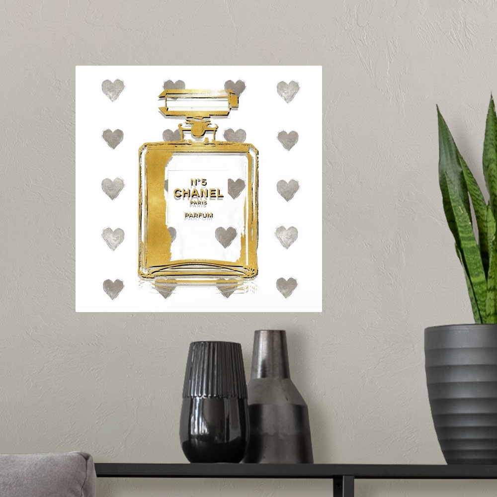 A modern room featuring A white background with hearts peek through a transparent bottle of perfume.