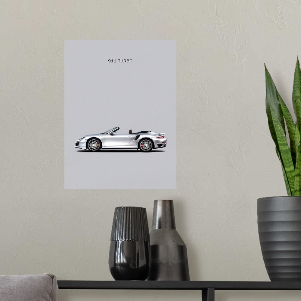 A modern room featuring Photograph of silver Porsche 911 Turbo Grey printed on a gray background