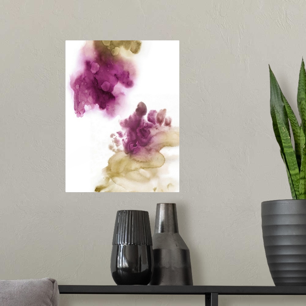 A modern room featuring Abstract painting with fuchsia and gold hues splattered together on a white background.