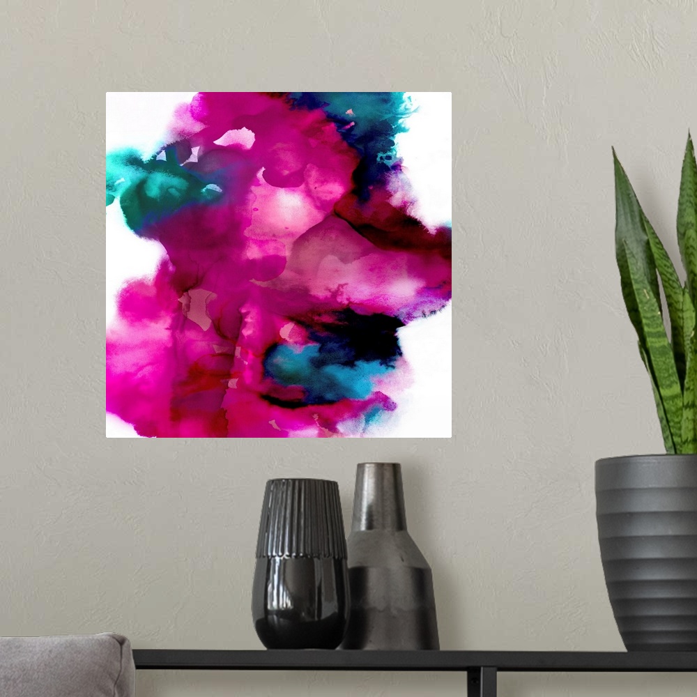 A modern room featuring Square abstract art made with shades of blue and bright pink on a white background.