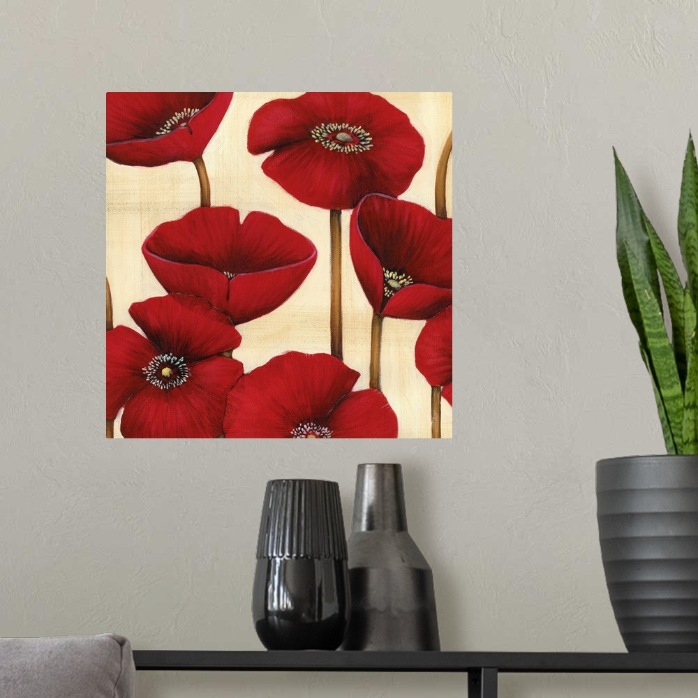 A modern room featuring Square contemporary artwork of red poppy flowers against a neutral backdrop.