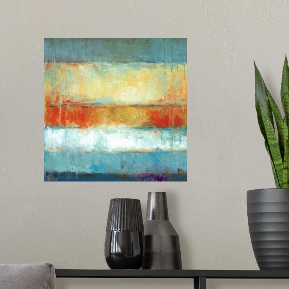 A modern room featuring Square abstract painting in textured colors of blue, orange, and yellow with horizontal stripes.