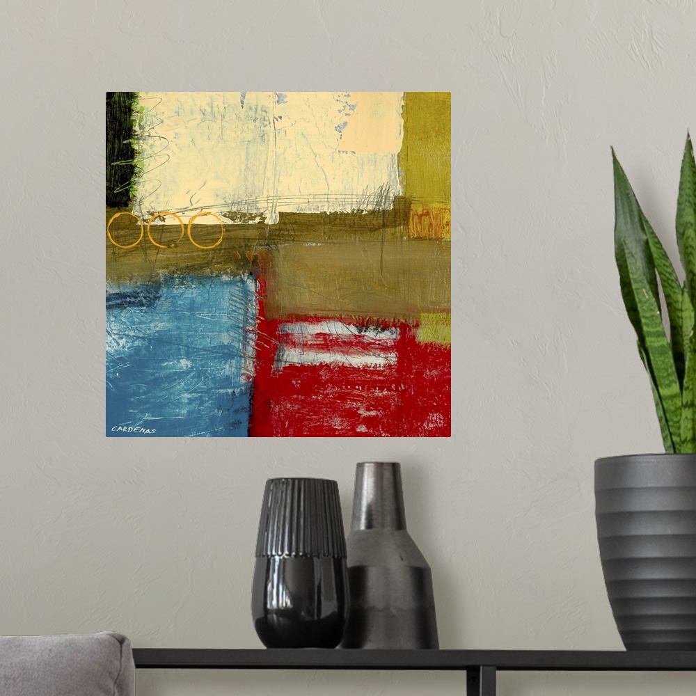 A modern room featuring Red, beige, green and blue abstract.