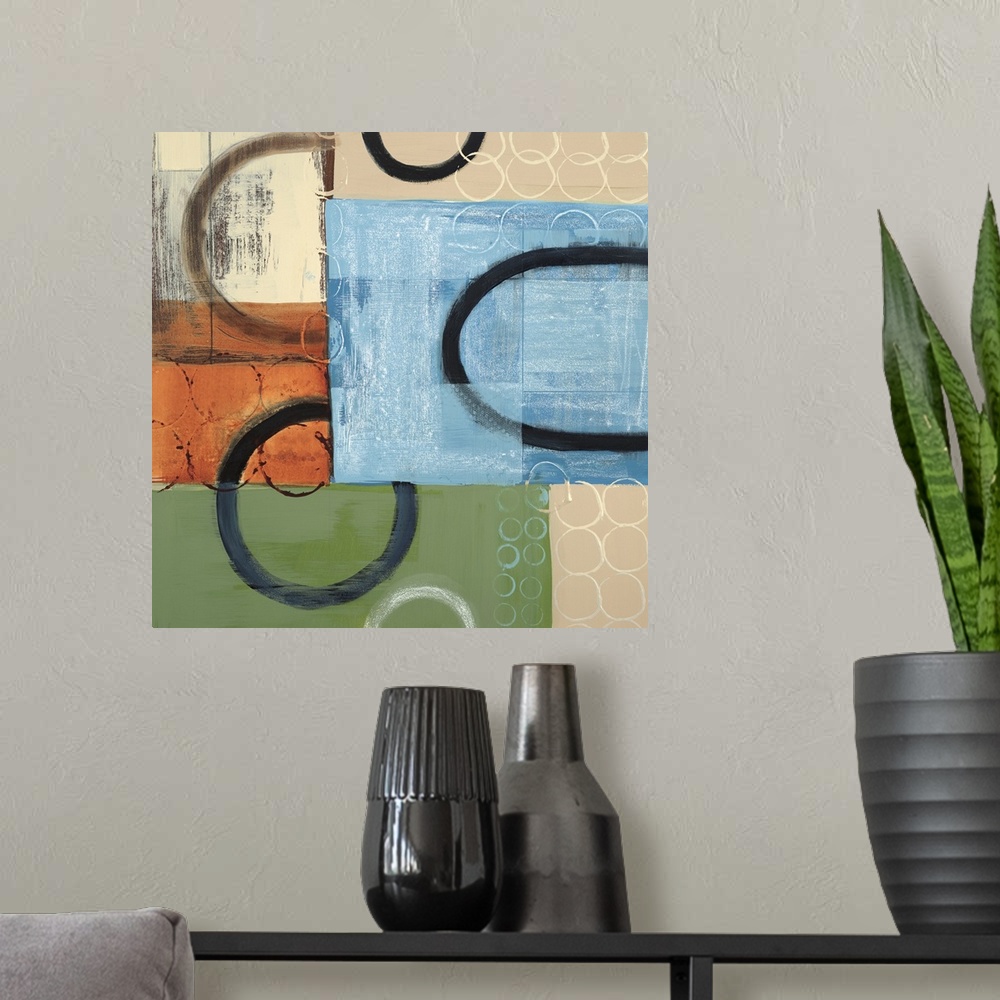 A modern room featuring Abstract painting of multi-colored squared shapes with circular elements in black and white overl...