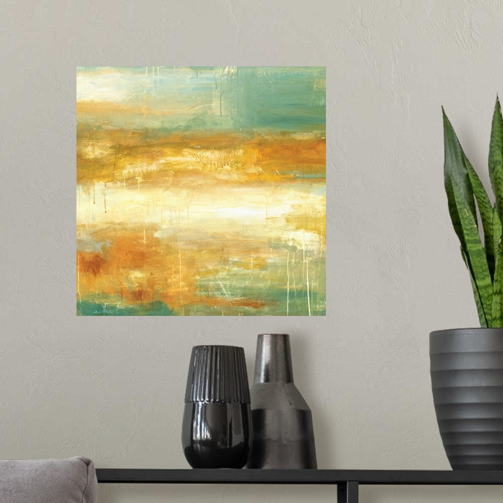 A modern room featuring Square abstract painting in textured colors of green, gold and cream.