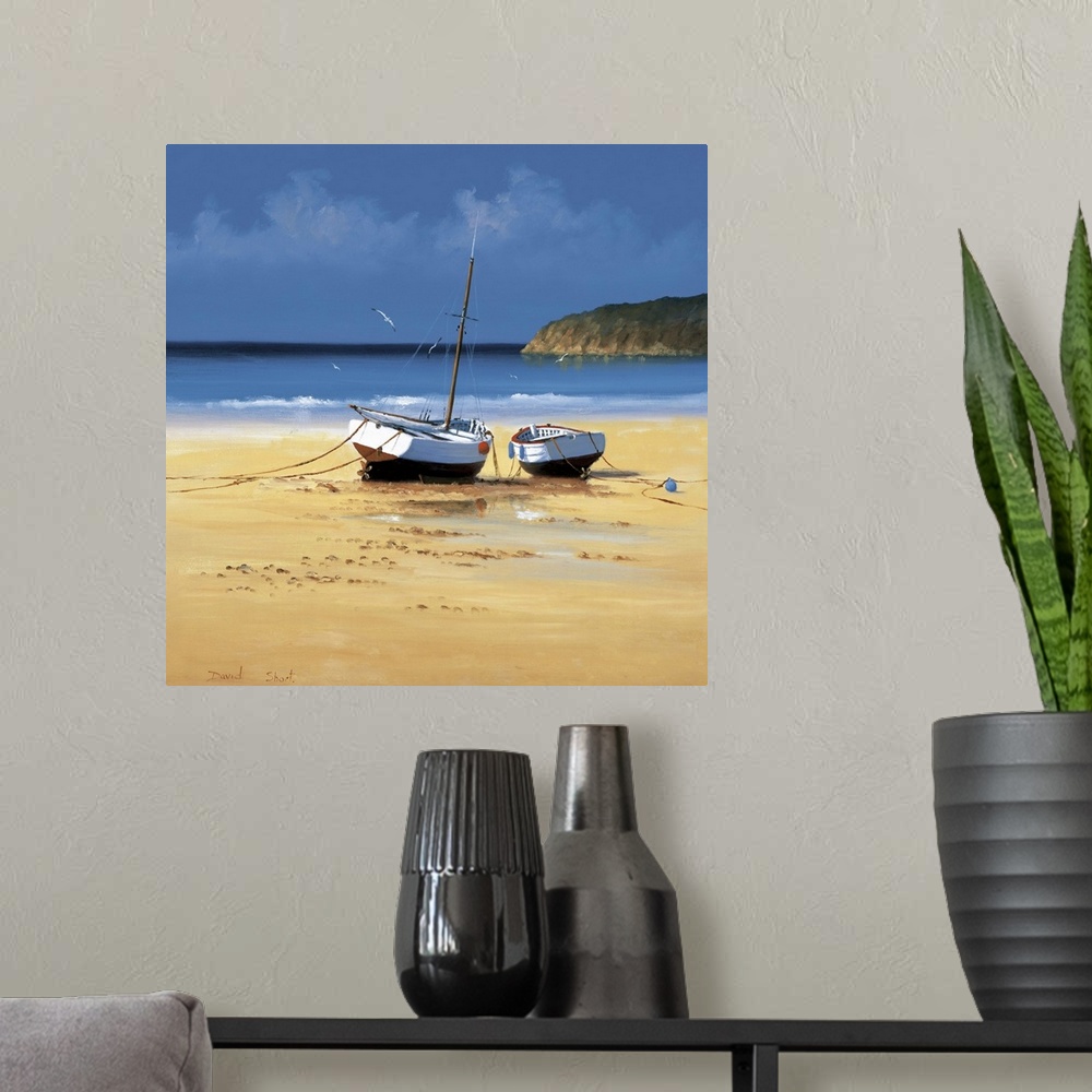 A modern room featuring Contemporary painting of two boats moored on a sandy beach.