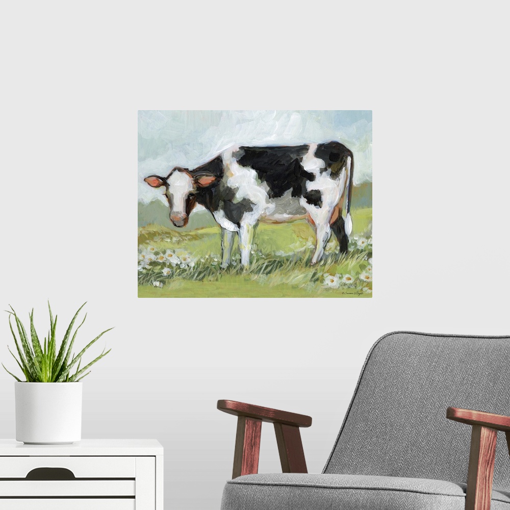A modern room featuring A black & white cow enjoys his pastoral setting!