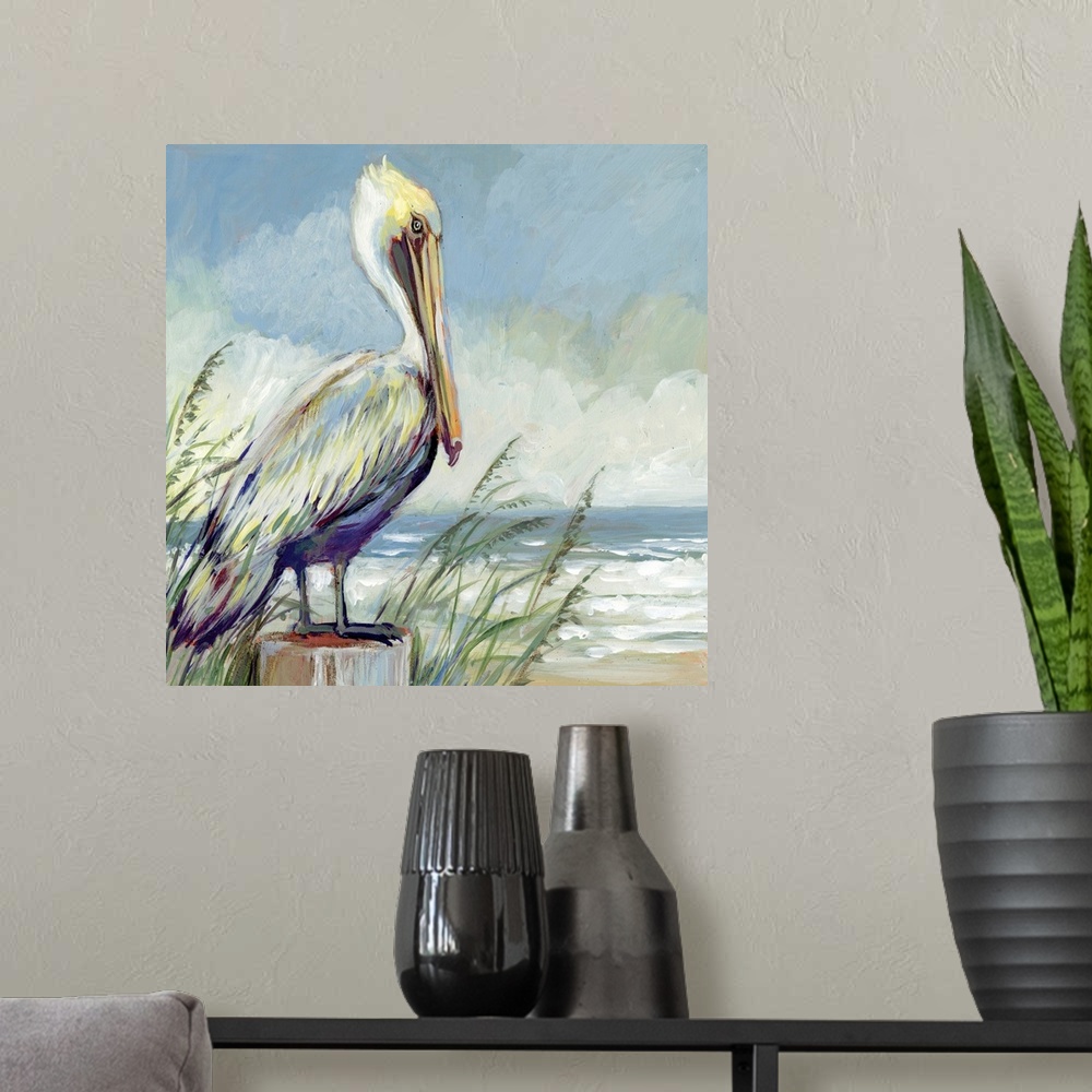 A modern room featuring A striking pelican sits and watches the tide.