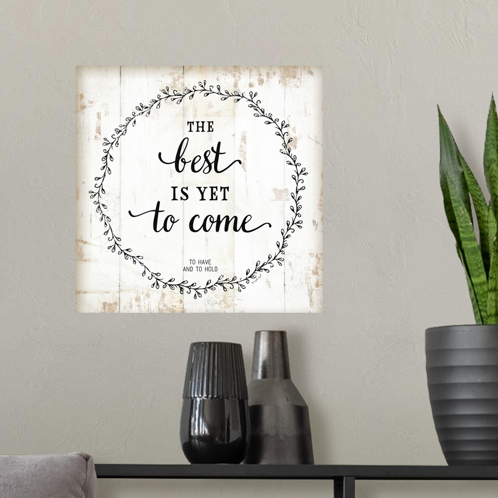 A modern room featuring The sentiment, "The best is yet to come." is black text and placed on a distressed white backgrou...