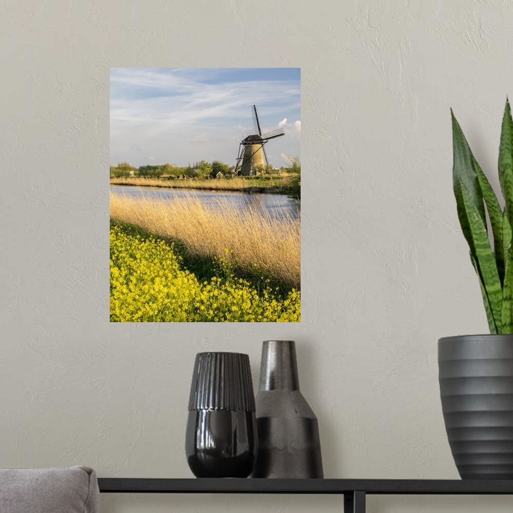 A modern room featuring Netherland, Kinderdijk. Windmills along the canal.