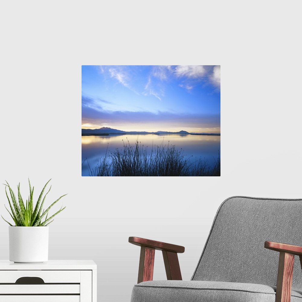 A modern room featuring Utah, Cache Valley, Great Basin, Cutler Reservoir on Bear River covered with cirrus fibratus and ...