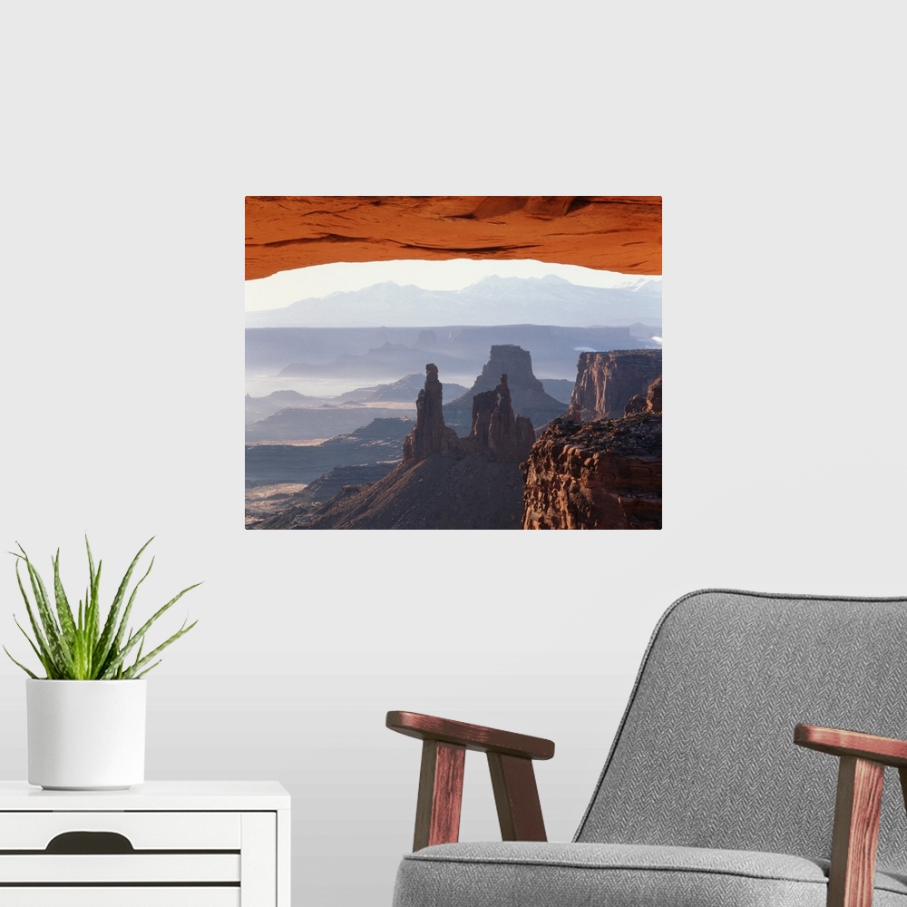 A modern room featuring Utah, Canyonlands National Park, View of Mesa Arch at sunrise.