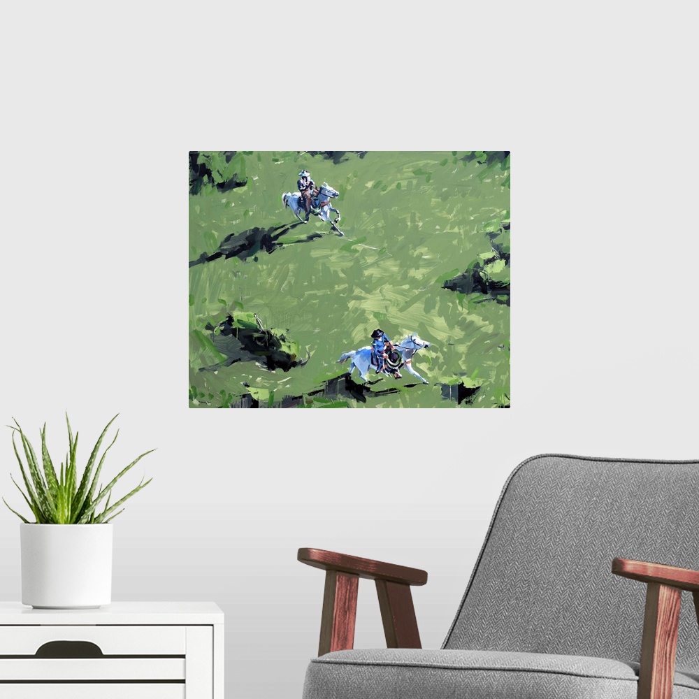 A modern room featuring Painting of an aerial view of two people of horseback, riding through a green field.
