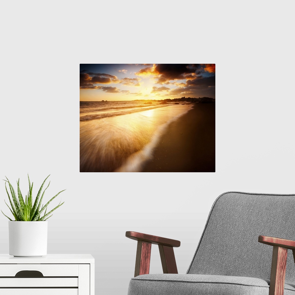 A modern room featuring Beautiful sunrise over an Australian Beach.