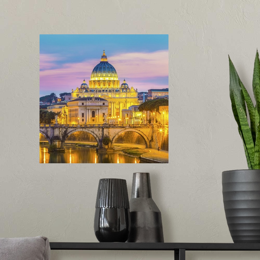 A modern room featuring Night view of old roman bridge of Hadrian and St. Peters cathedral in Vatican city Rome, Italy.