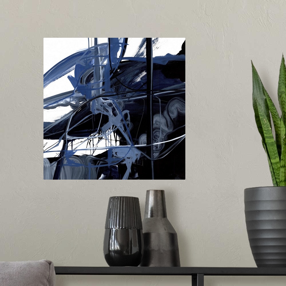 A modern room featuring A contemporary abstract painting of dark blue and black splashes of paint on an off-white surface.