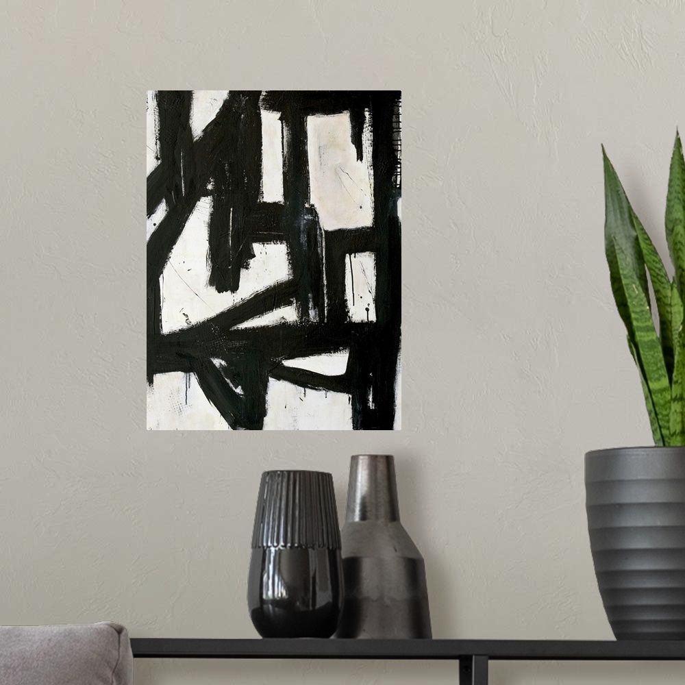 A modern room featuring Contemporary abstract painting with thick black lines on white.