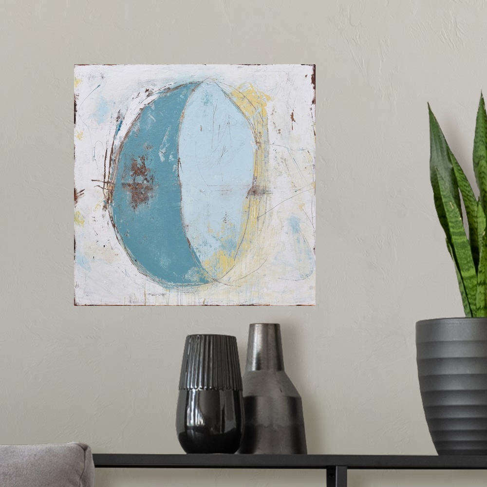 A modern room featuring Contemporary abstract painting of a crescent shape in pale blue against a putty colored background.