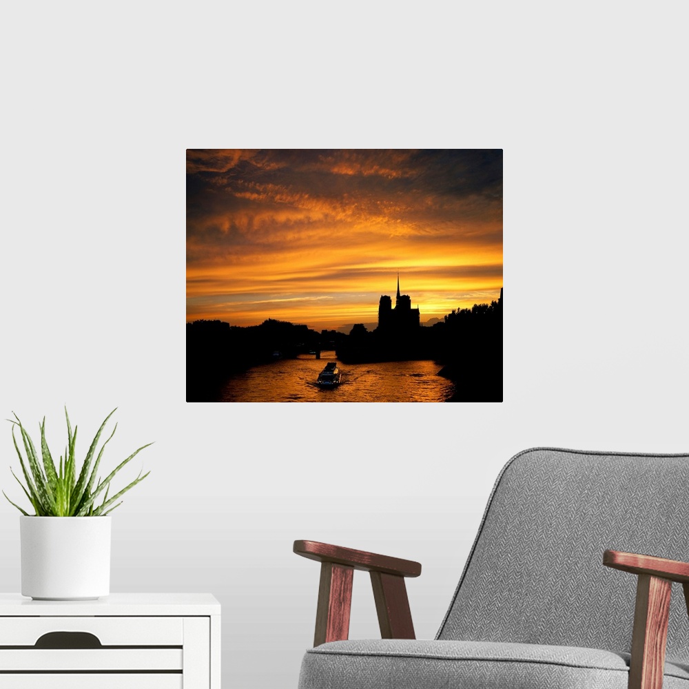 A modern room featuring France, Paris, view of the Seine and Norte Dame at sunset