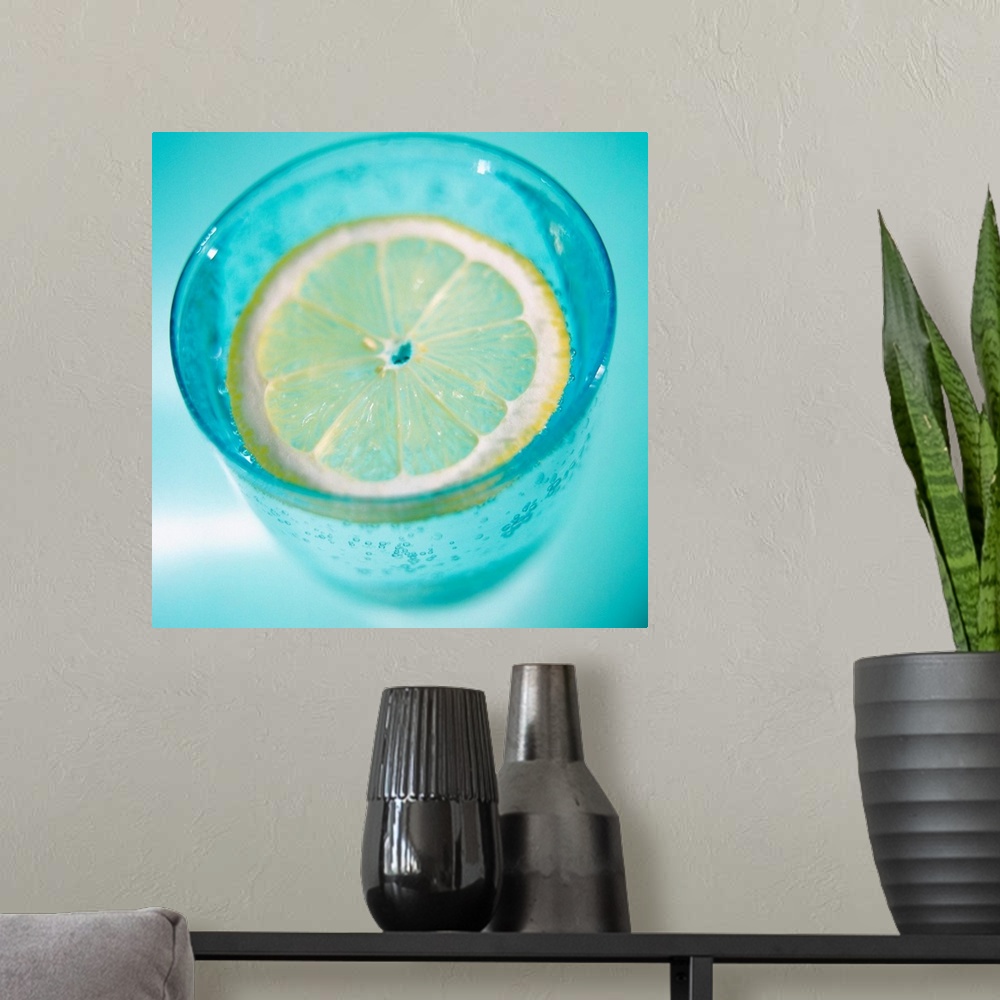 A modern room featuring Glass of water and lemon