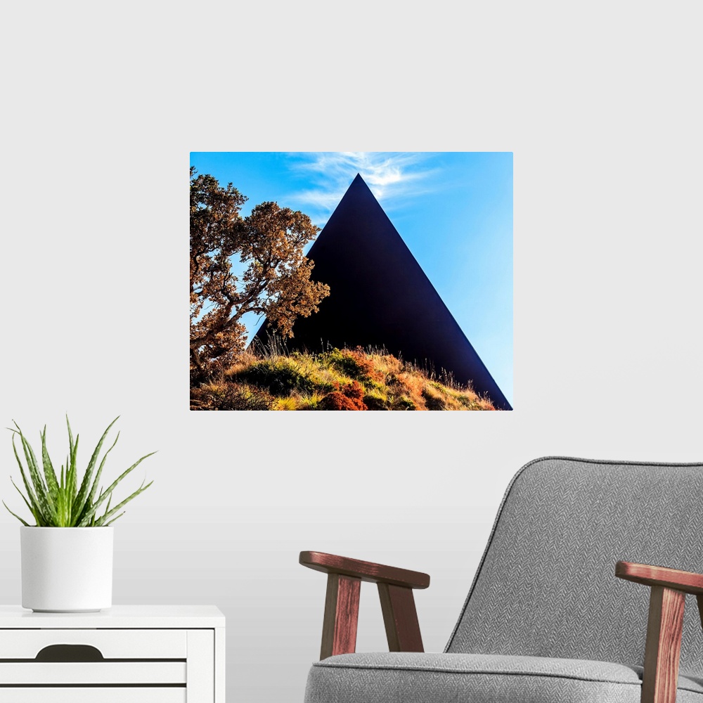 A modern room featuring Italy, Sicily, Castel di Tusa, The pyramid, 38th parallel in the Fiumara d'Arte outdoor sculpture...
