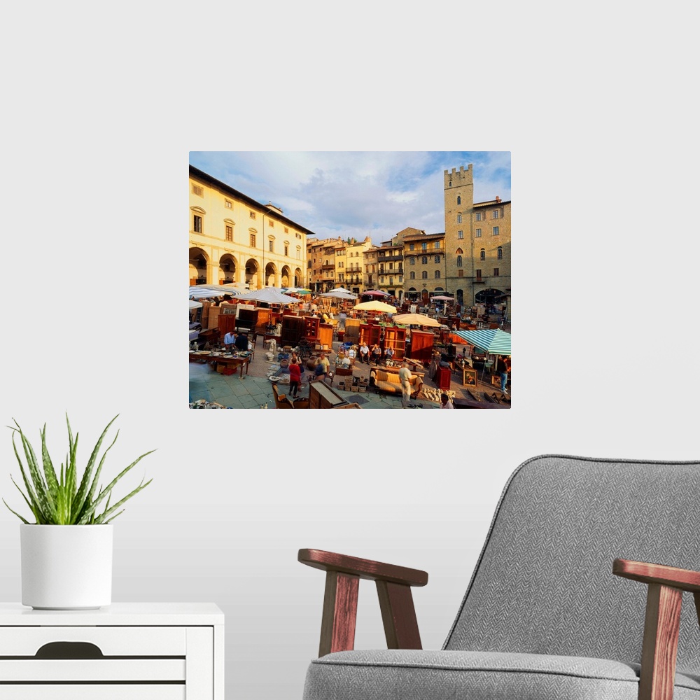 A modern room featuring Italy, Tuscany, Arezzo, Piazza Grande, antique trade market