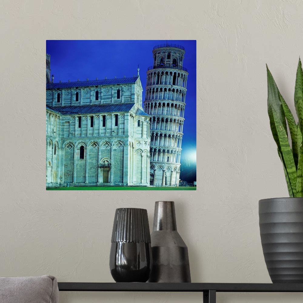 A modern room featuring Italy, Tuscany, Pisa, The cathedral and leaning tower at twilight