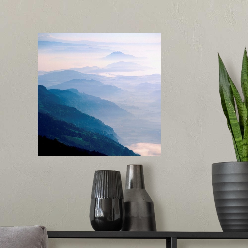 A modern room featuring Mountains and hills in mist