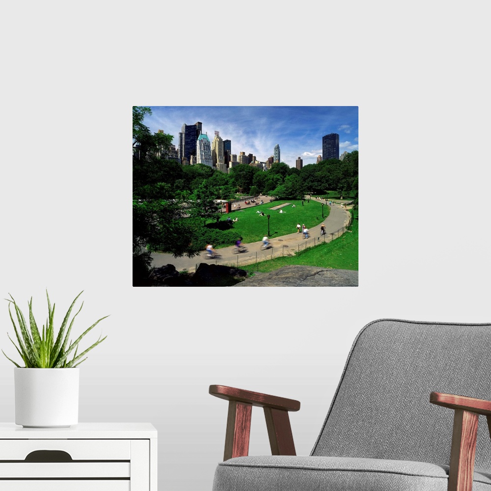 A modern room featuring New York City, Central Park, bicycle riders